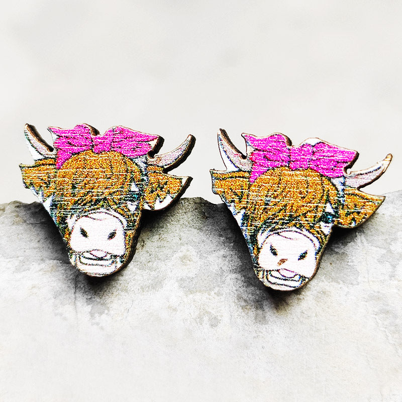 2 pares al por mayor/paquete Lightning Lightning Bull Head Coss Pendientes
